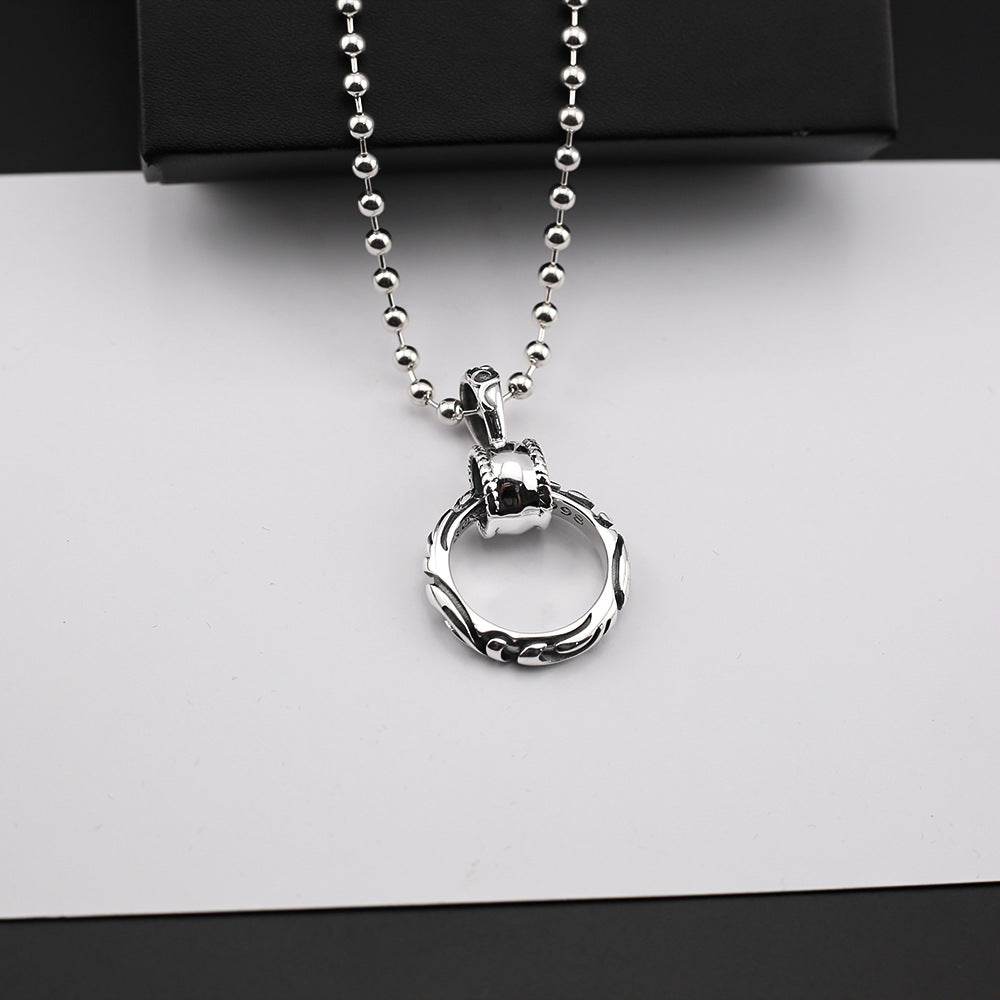 Chrome Hearts patterned ring pendant necklace