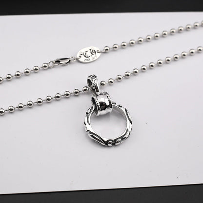 Chrome Hearts patterned ring pendant necklace