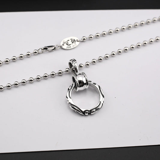 Chrome Hearts patterned ring pendant necklace